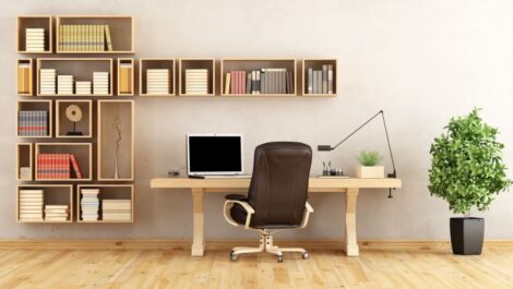 A home office with intricate floating shelves.