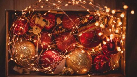 Christmas ornaments and Christmas lights in box.